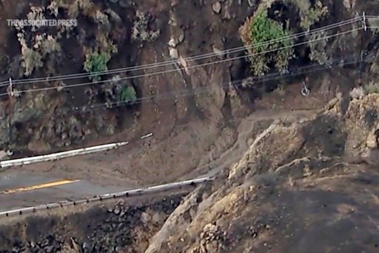 An aerial view of a mudflow, which is like a quick-moving mudslide, in southern California