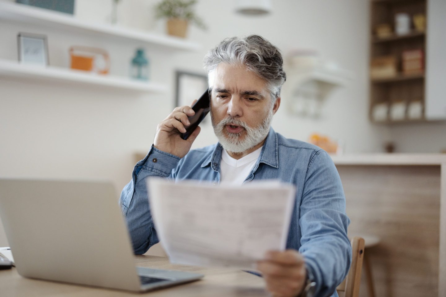 Stressed Man Talking on Phone.
