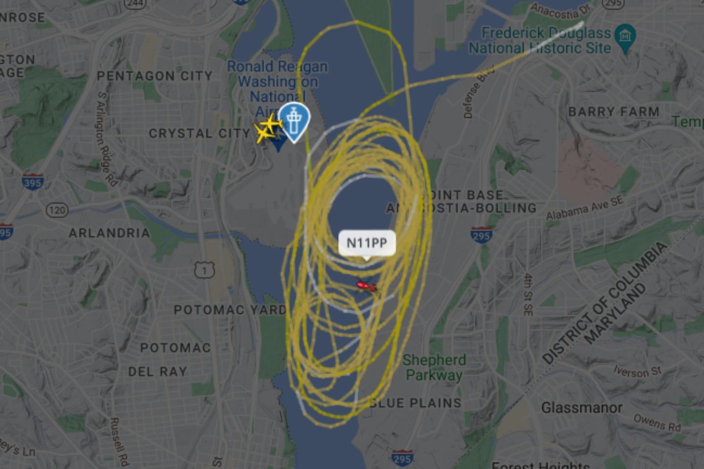 A Flight Radar screenshot showing a state helicopter circling the skies over the Potomac River.