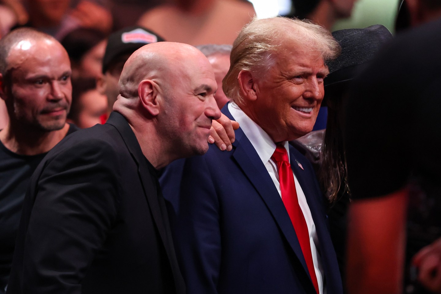 Dana White stands next to Donald Trump