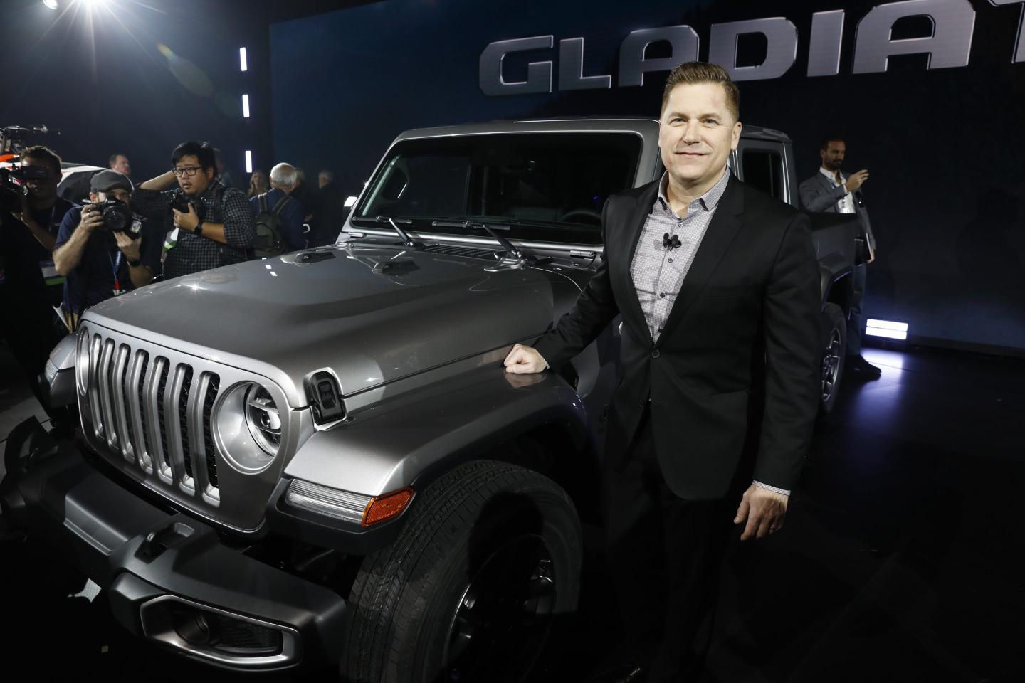 Tim Kuniskis, head of Jeep brand North America at Fiat Chrysler Automobiles NV, stands for a photograph next to a vehicle during AutoMobility LA ahead of the Los Angeles Auto Show in Los Angeles, California, U.S., on Wednesday, Nov. 28, 2018.