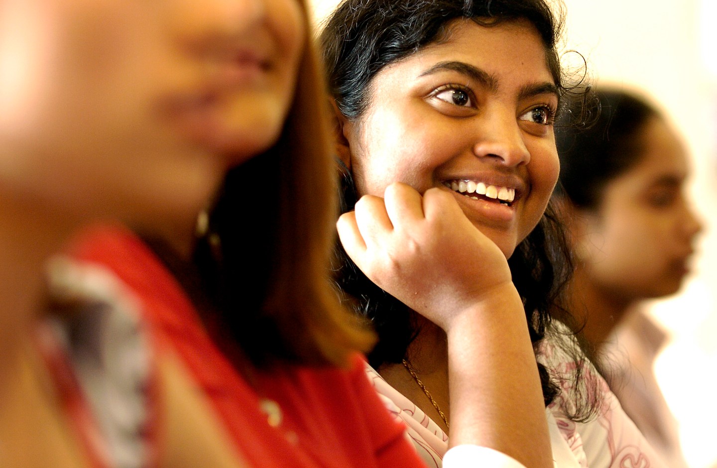 A young woman smiles