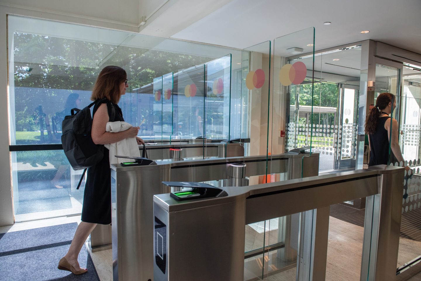 Employees arrive at Mastercard headquarters