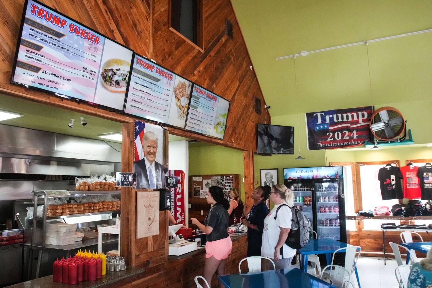 People line up to order food during lunch at Trump Burger 