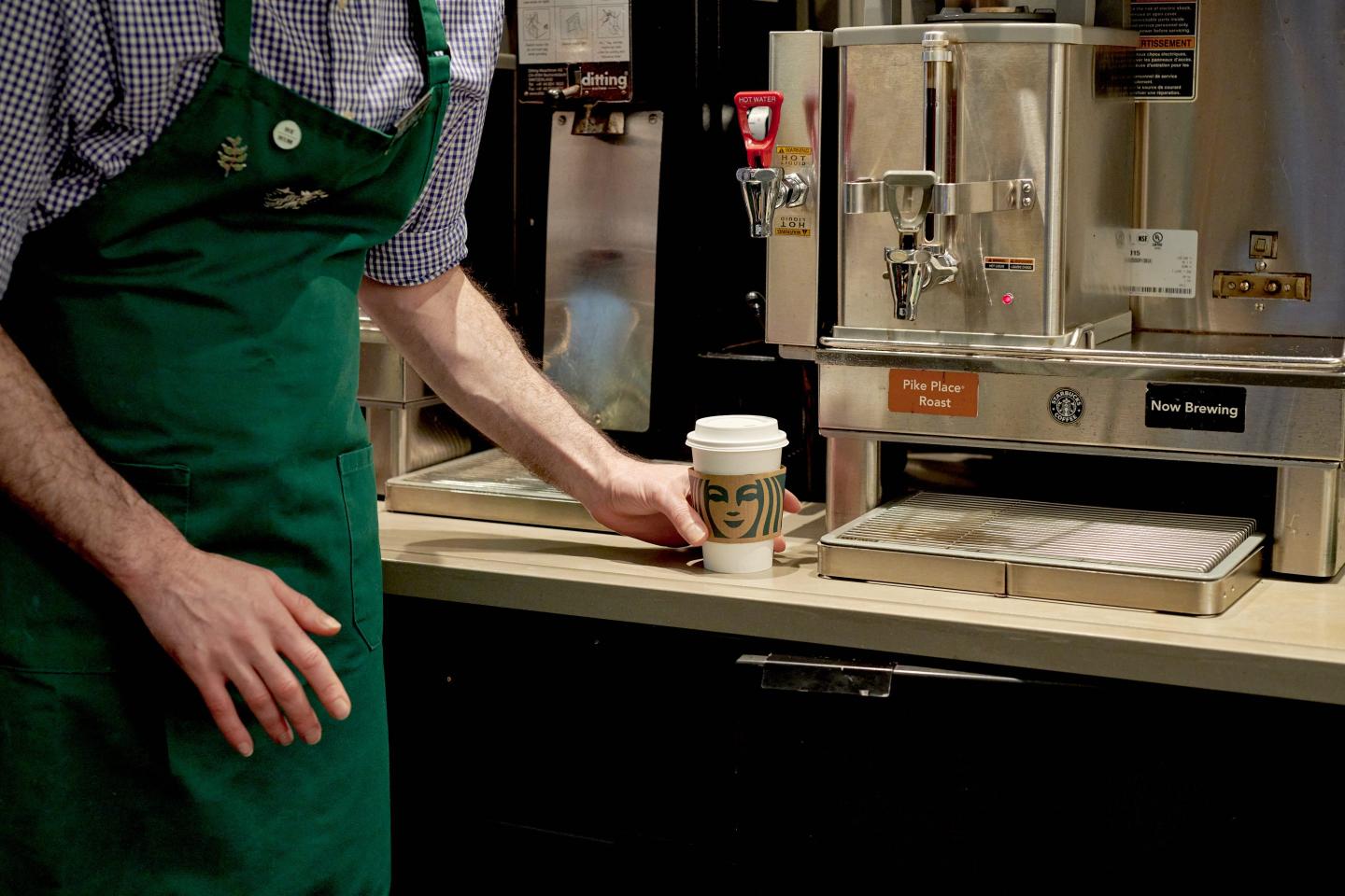 Free refills and handwritten names on cups: Everything old is new again at Starbucks