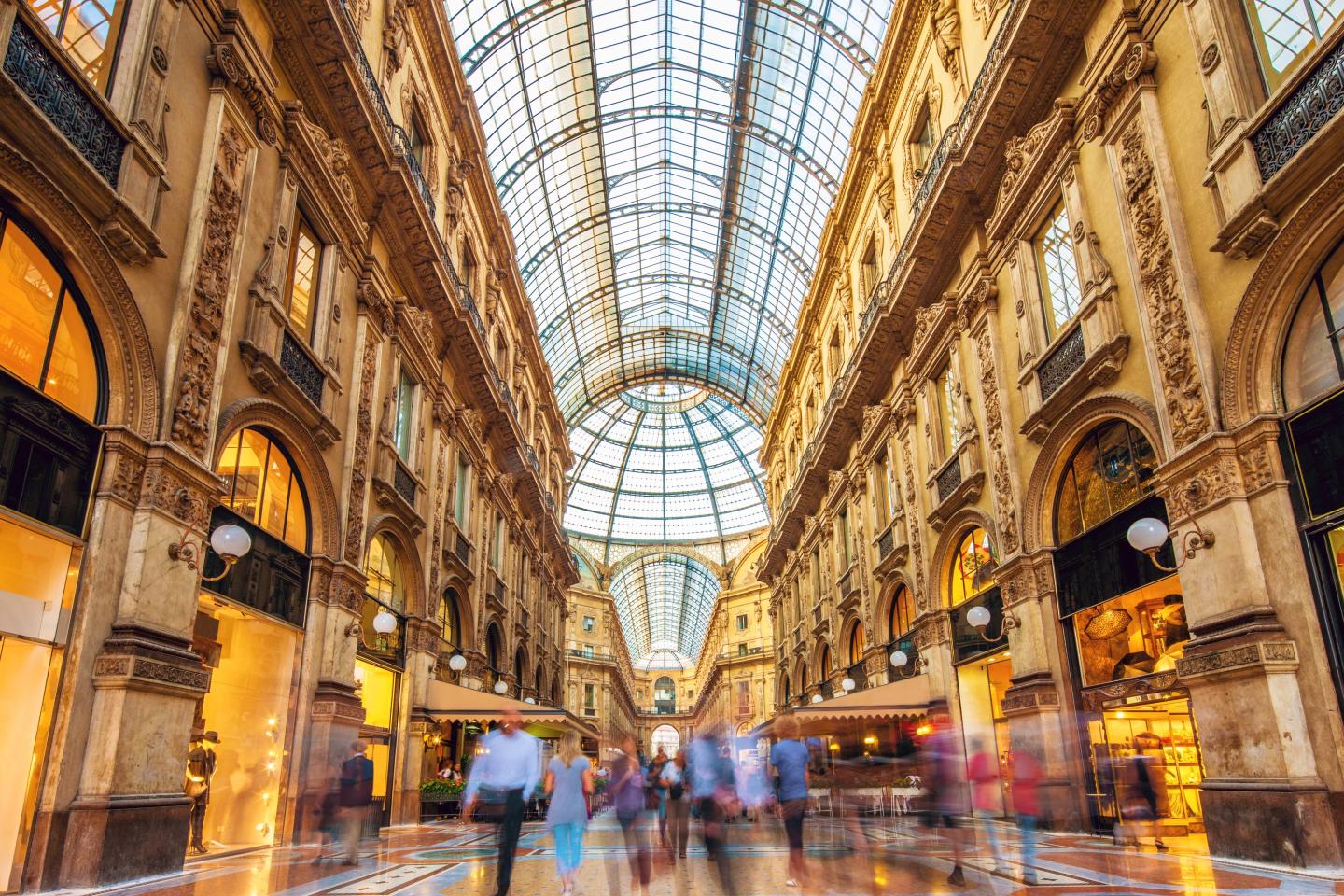 people walking in Milan shopping area