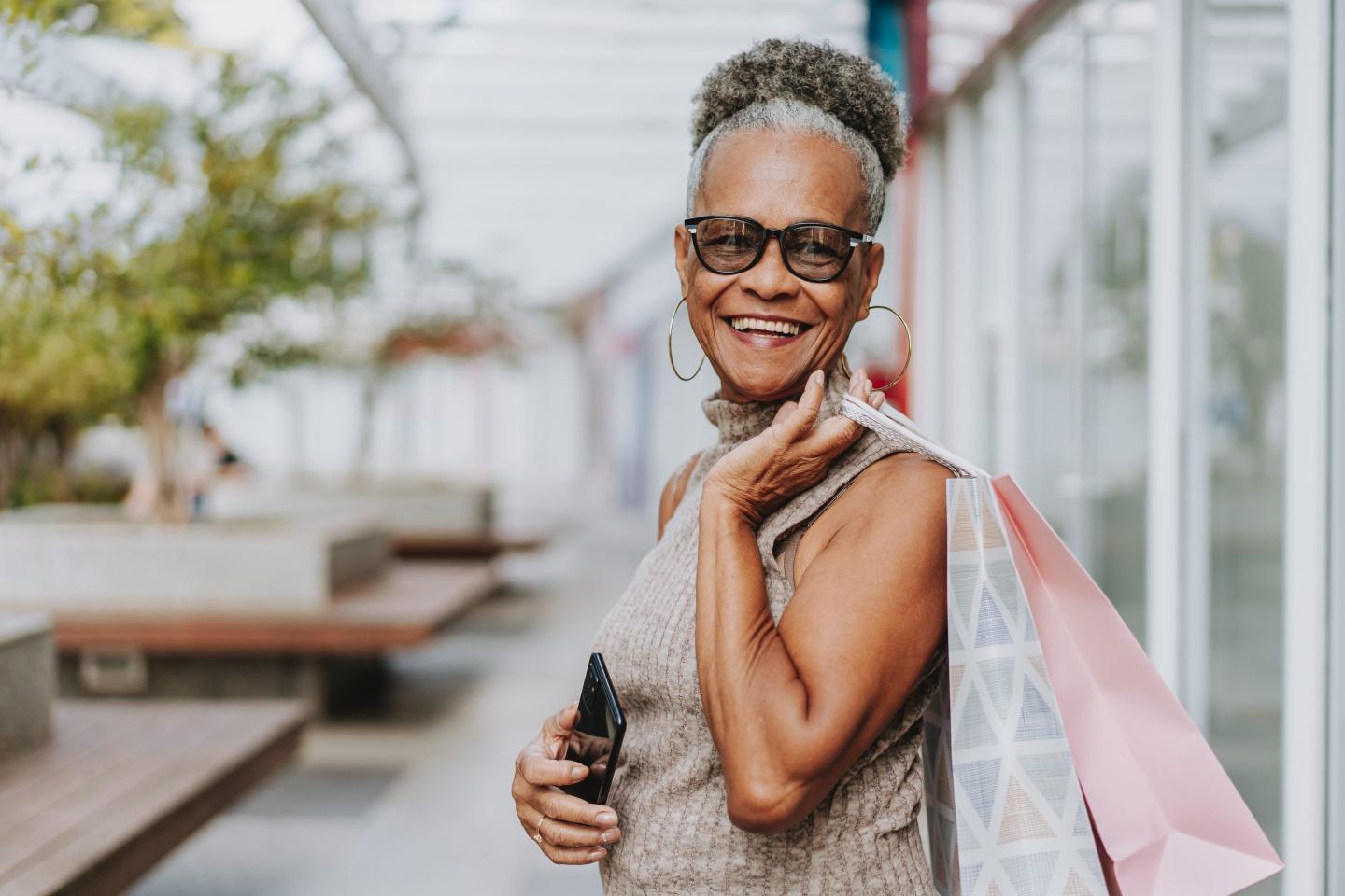 Portrait of a woman shopping with shopping bag