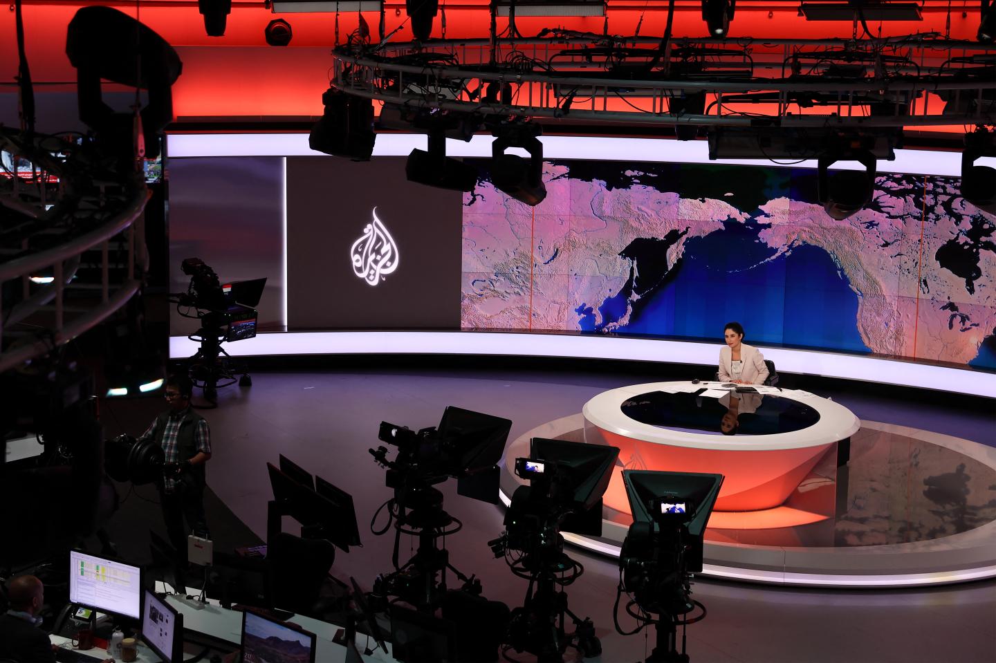 This picture shows a view of the newsroom at the main headquarters of Qatari news broadcaster Al Jazeera in the capital Doha on May 6, 2024. Al Jazeera went off-air in Israel on May 5, after Prime Minister Benjamin Netanyahu's government decided to shut it down following a long-running feud, a move the Qatar-based channel decried as "criminal". (Photo by KARIM JAAFAR / AFP) (Photo by KARIM JAAFAR/AFP via Getty Images)