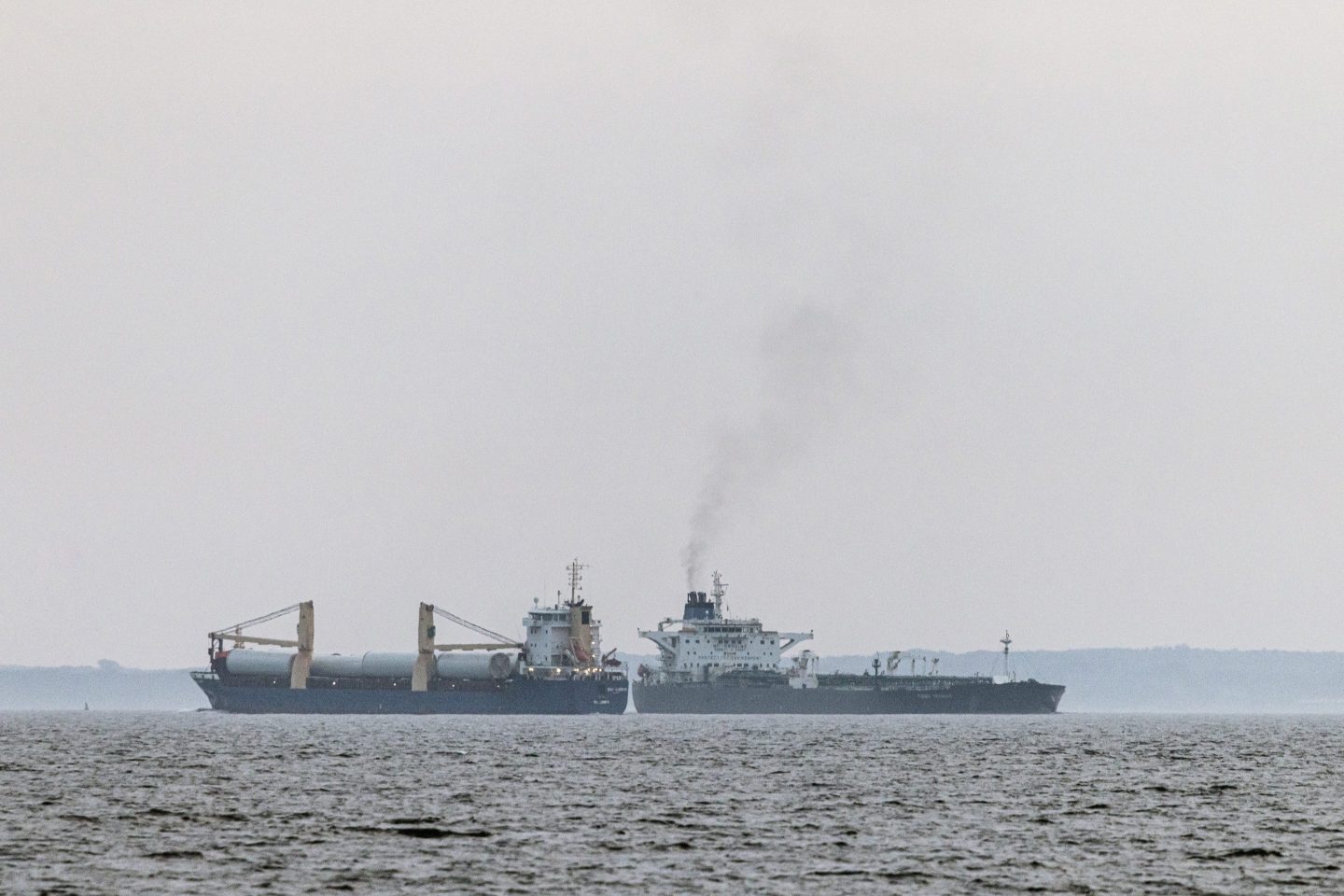 The shadow fleet tanker Turbo Voyager, right, passes within 600 meters of a general cargo vessel as it transits through the Great Belt of Denmark off the coast of Agerso, Denmark, on Aug. 15. 2024.
