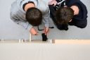 Students put their mobile phones in their lockers after switching them off