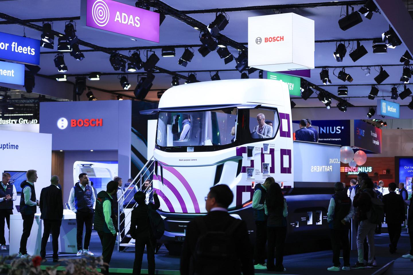 Visitors look at truck applications on the Robert Bosch GmbH booth at the IAA Transportation fair in Hannover, Germany, on Monday, Sept. 16, 2024. The commercial vehicle exhibition runs until Sept. 22.
