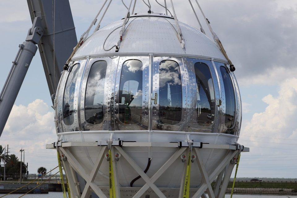 a metallic ball like space ship