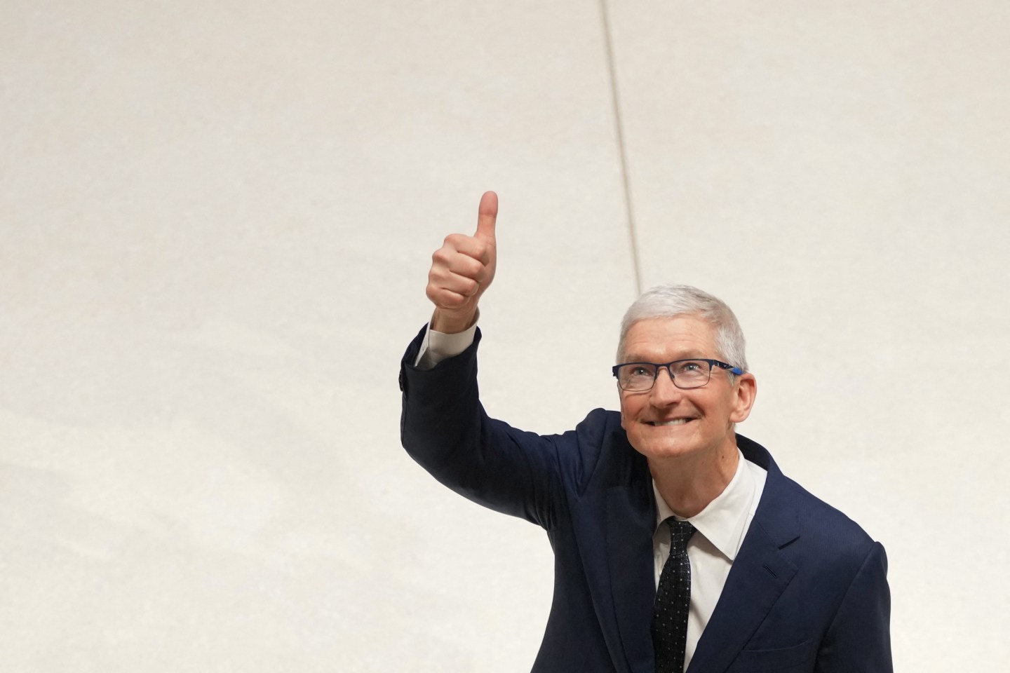 Apple CEO Tim Cook during a visit of the firm's UK headquarters in London on December 12, 2024. (Photo: Kin Cheung/POOL/AFP/Getty Images)