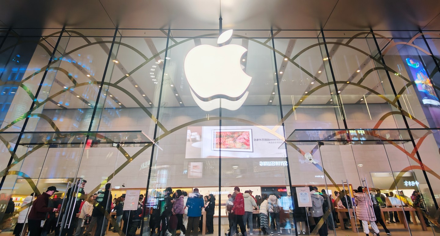 Customers gather at an Apple store in Shanghai, China, on Jan. 4, 2025.