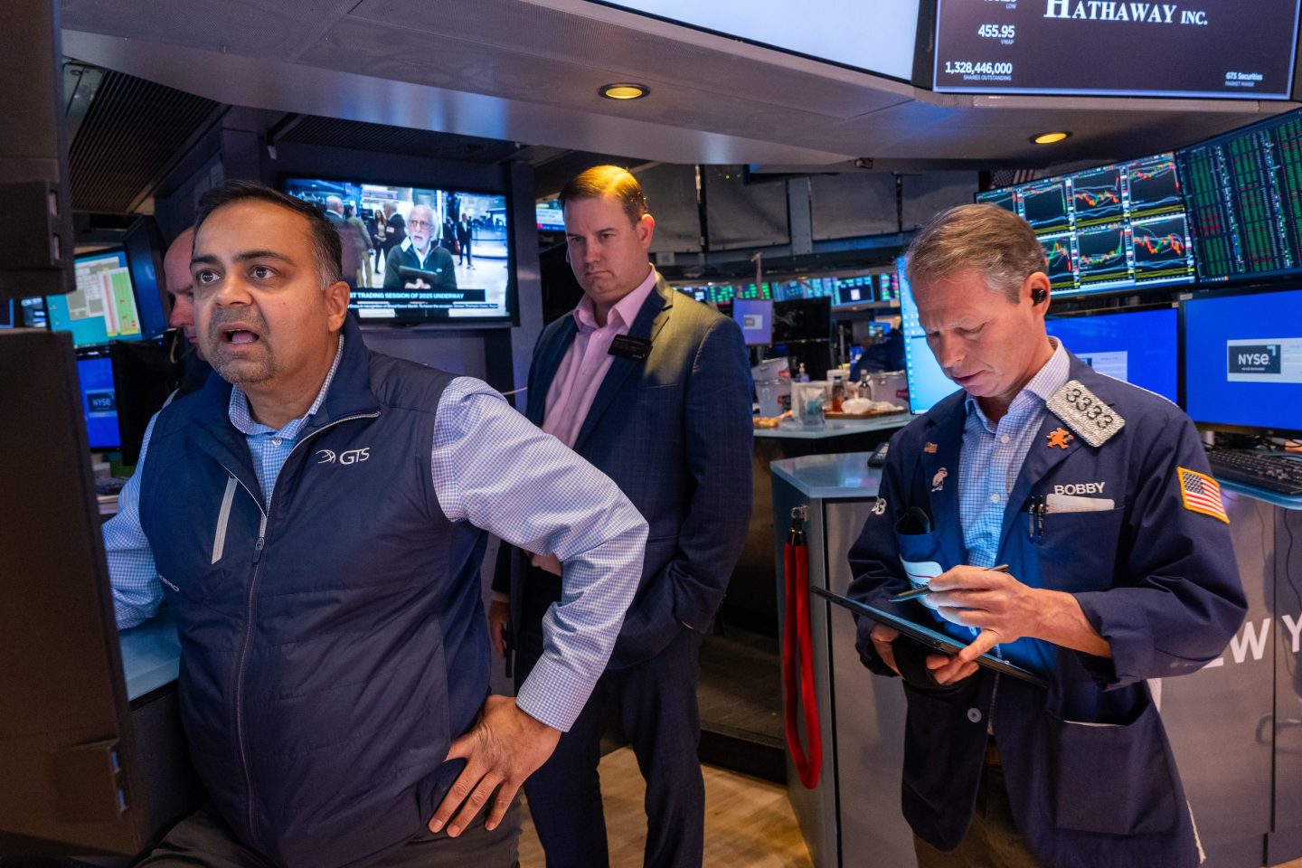 Traders work on the floor of the New York Stock Exchange (NYSE)