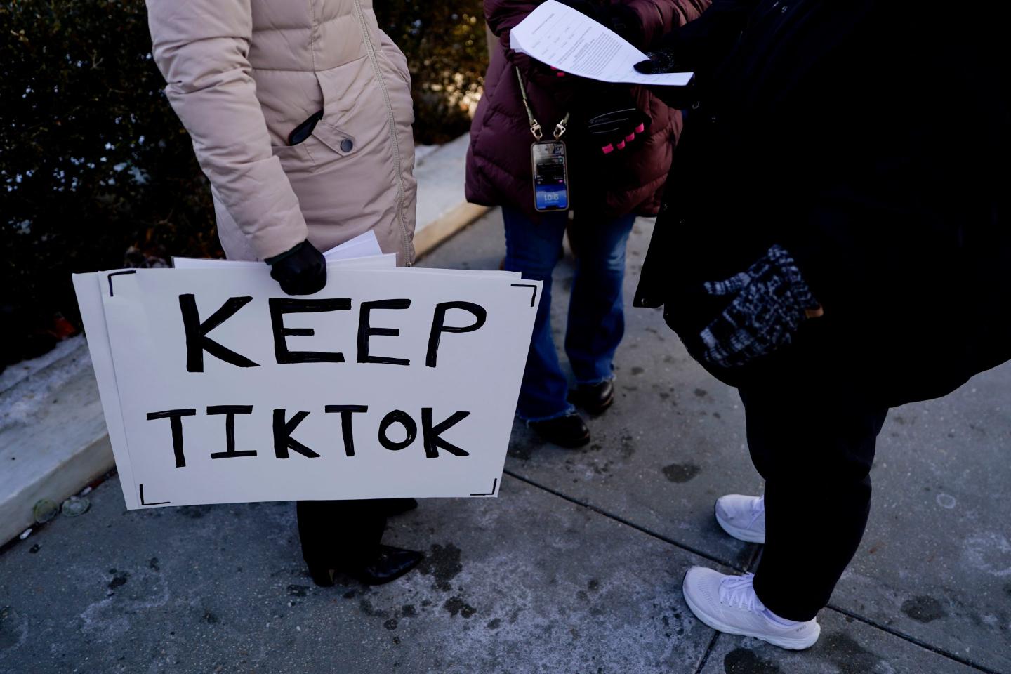 A demonstrator holds a "Keep TikTok" sign outside the US Supreme Court in Washington, DC, on Jan. 10.