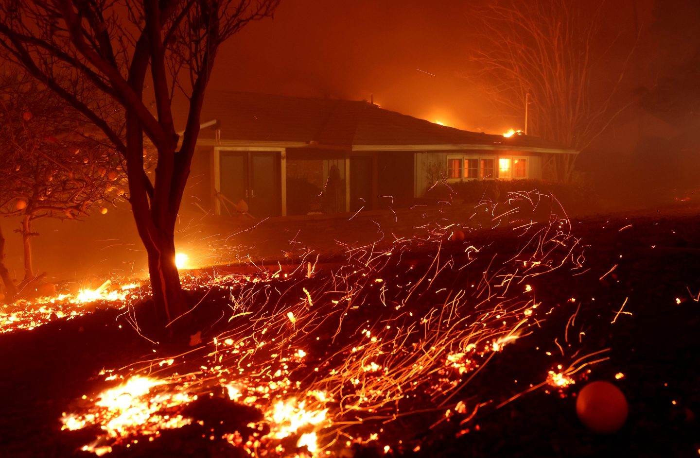 A home in Altadena, California as the Eaton Fire rages through.