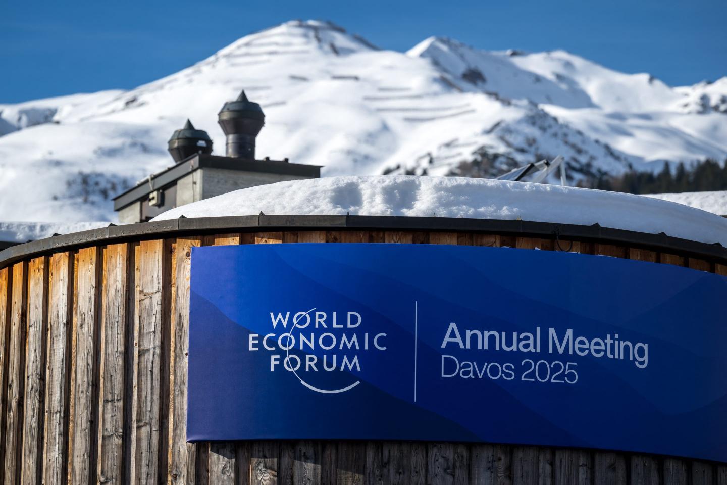 A sign denoting the World Economic Forum (WEF) is seen at the Congress Center during the WEF annual meeting in the Alpine resort of Davos on January 20, 2025.