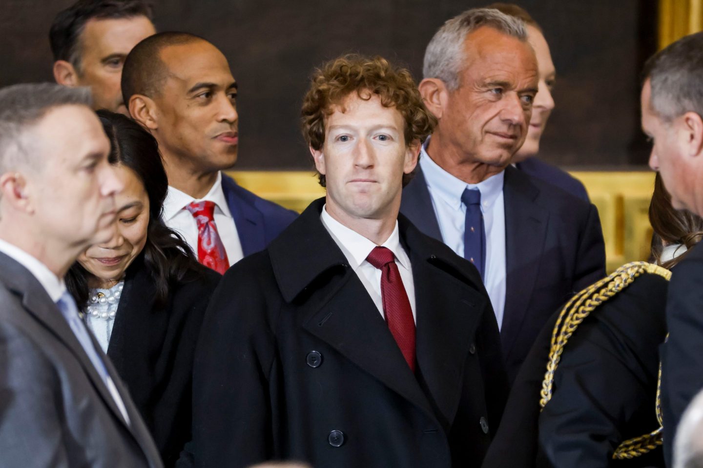 Mark Zuckerberg, chief executive officer of Meta Platforms Inc., center, arrives for the 60th presidential inauguration in the rotunda of the US Capitol in Washington, DC, US, on Monday, Jan. 20, 2025.