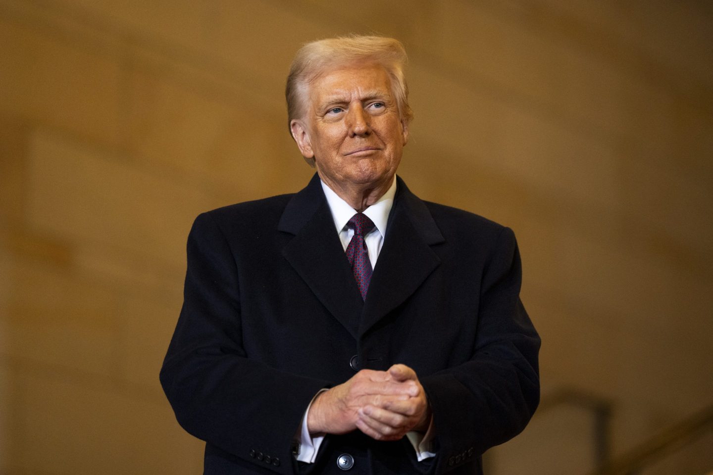US President Donald Trump waits to speak in Emancipation Hall during inauguration ceremonies at the US Capitol in Washington, DC, on January 20.