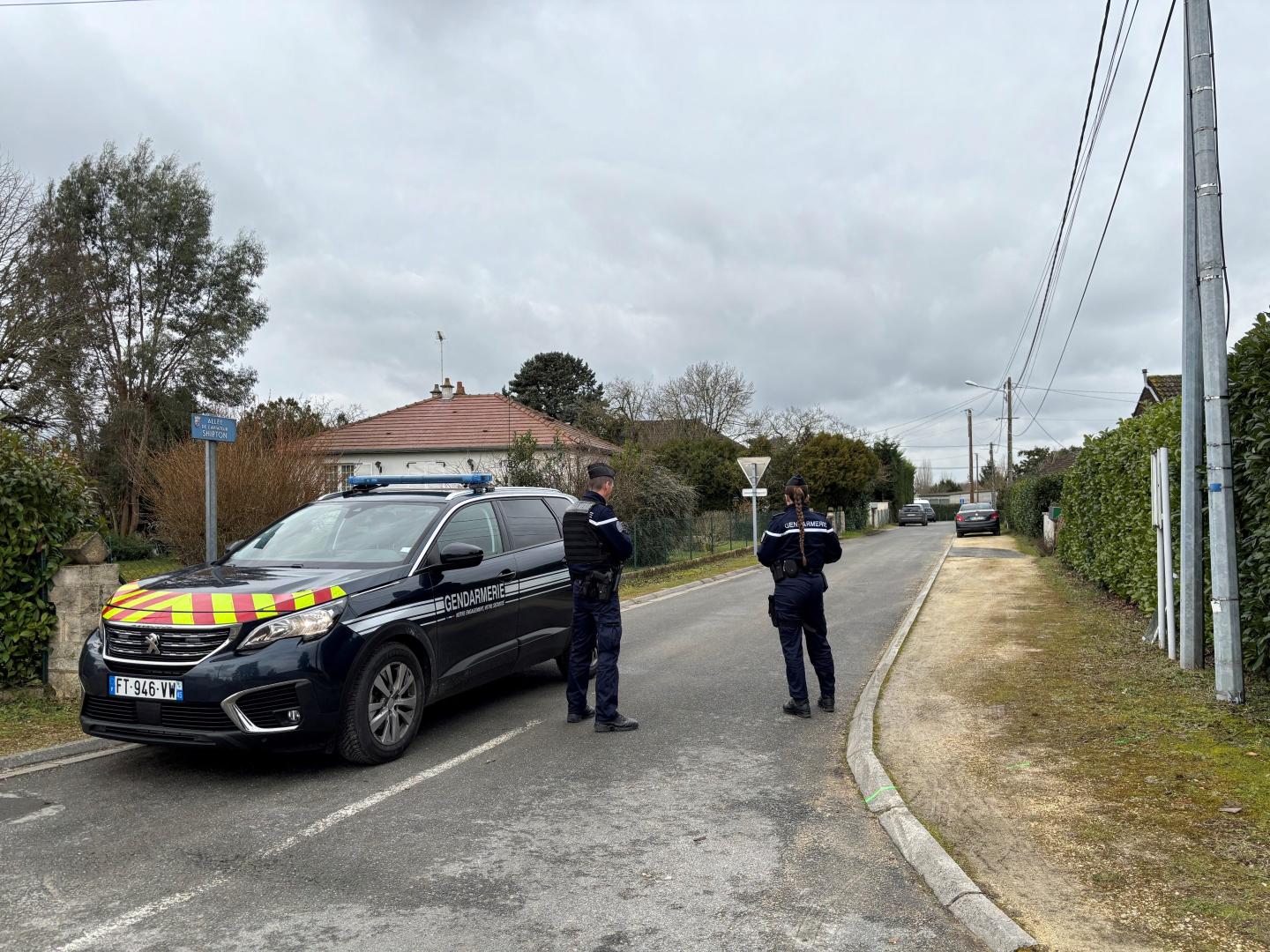 French gendarmes stand alert on a street in Mereau, near Vierzon, central France on January 23, 2025, as they secure the area following the kidnapping of David Ballard - the co-founder of a company specialising in securing cryptoassets. The co-founder of a company specialising in securing cryptoassets, who was kidnapped on January 21, in France's Cher department for ransom, was released by the gendarmerie on January 22, the Paris public prosecutor's office, which is leading the investigation said. David Balland, a partner and co-founder of Ledger, was kidnapped from his home in the early hours of January 22, he was then held 'at another address', the public prosecutor's office said.
