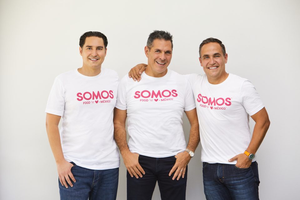 The three founders of Somos wear white t-shirts