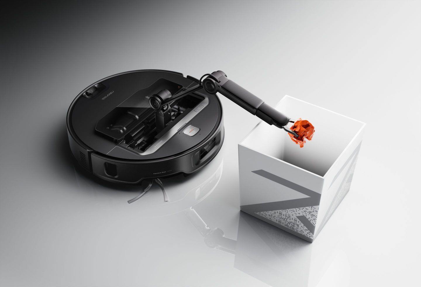 Roborock's new flagship vacuum will come with a robotic arm to pick up small items.
