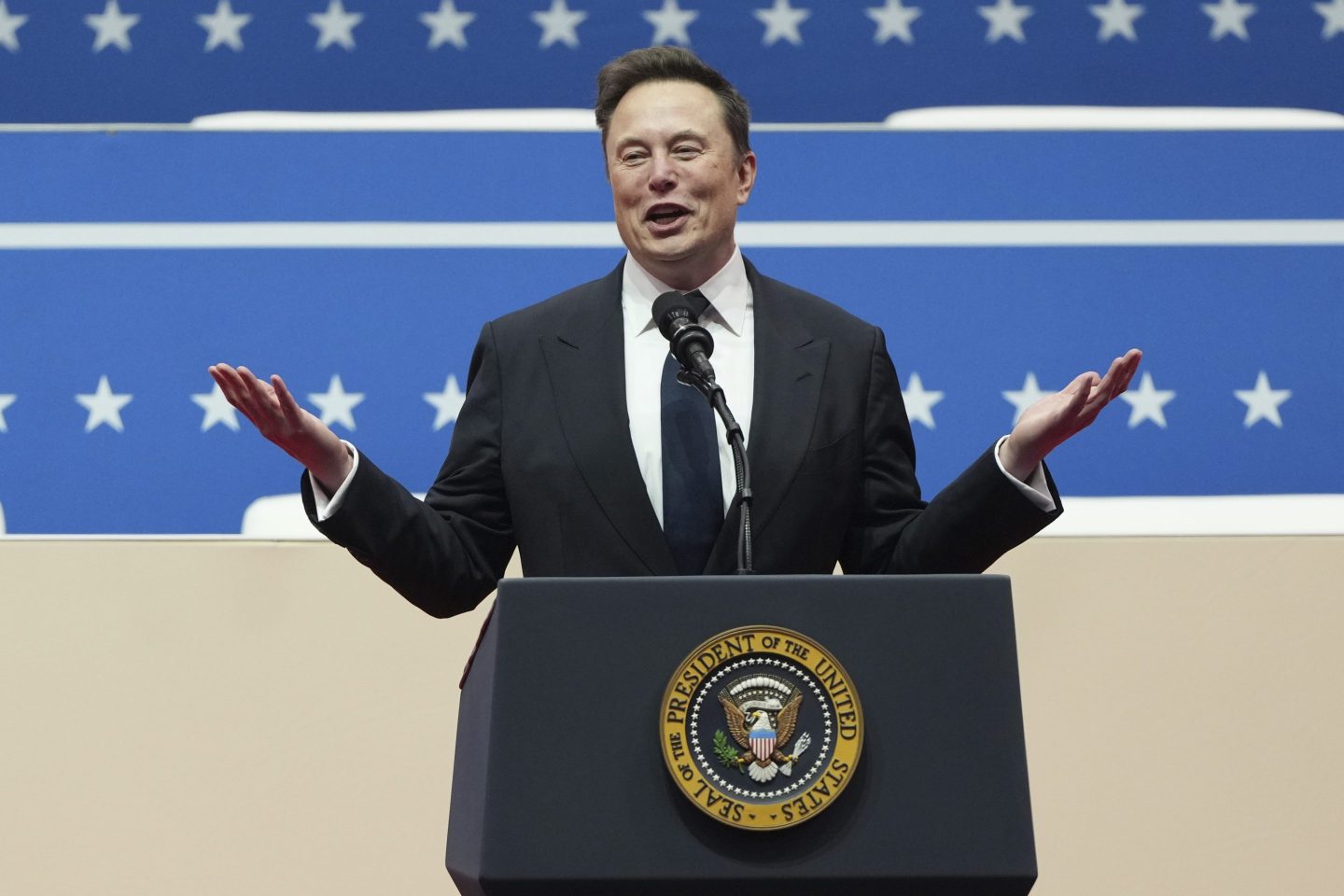 Elon Musk speaks at an indoor Presidential Inauguration parade event on Jan. 20.