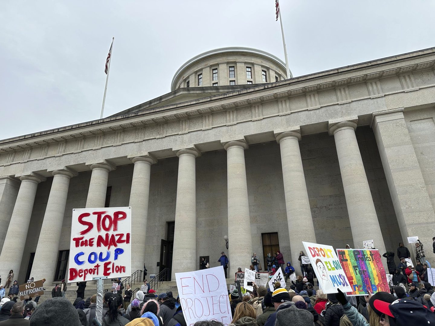 Protesters gather at the Ohio Statehouse in Columbus, to demonstrate against the actions of Republican President Donald Trump and billionaire ally Elon Musk.