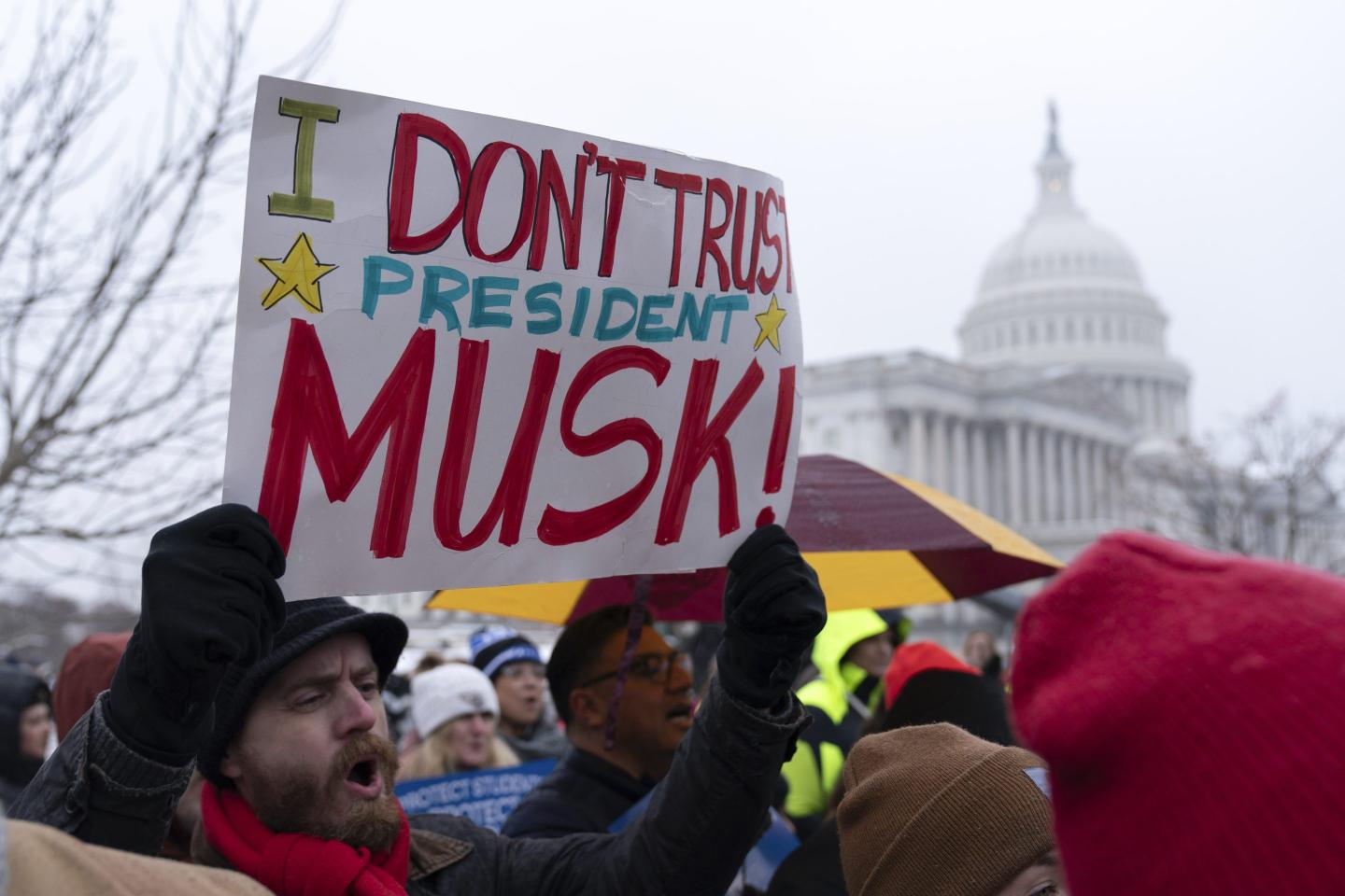 Federal judge clears key hurdle for Trump and Musk’s government employee buyout plan