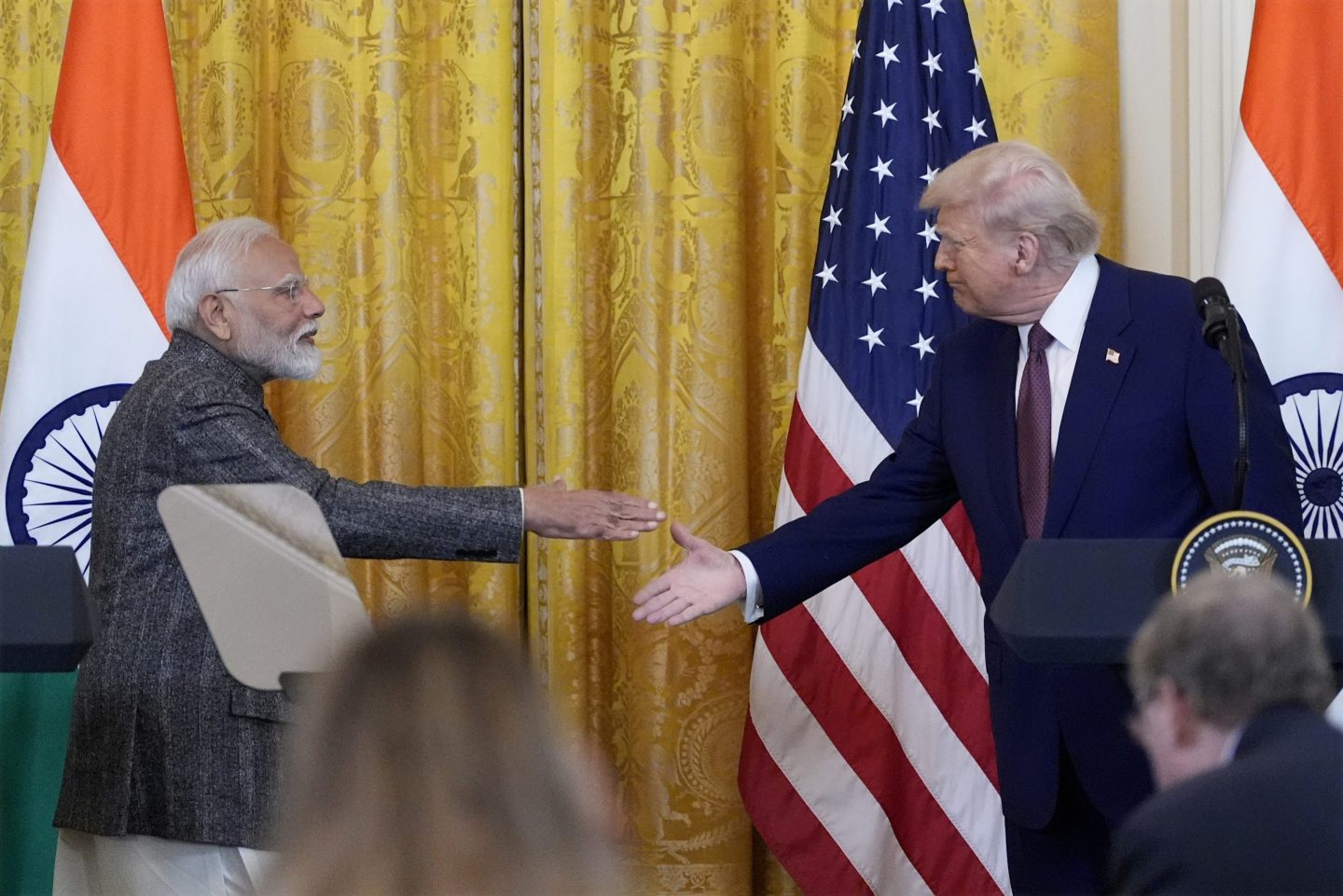 President Donald Trump and India's Prime Minister Narendra Modi shake hands during a news conference in the East Room of the White House, on Feb. 13, 2025, in Washington.