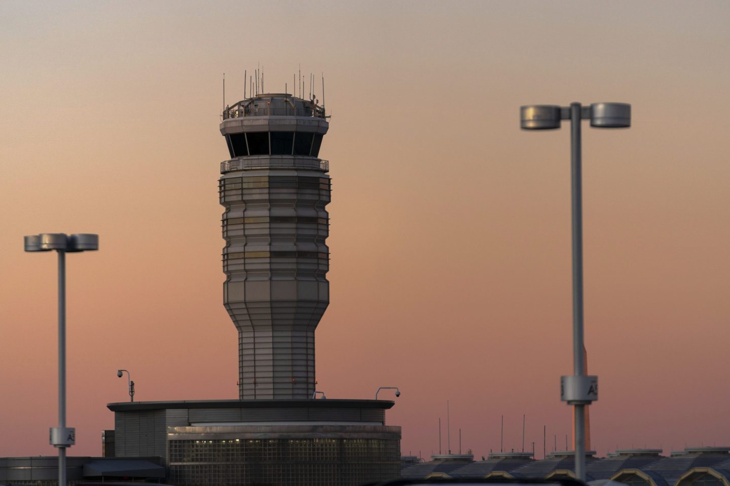 The air traffic control tower at Ronald Reagan Washington National Airport is seen at sunset, on Feb. 1, 2025, in Arlington, Va..
