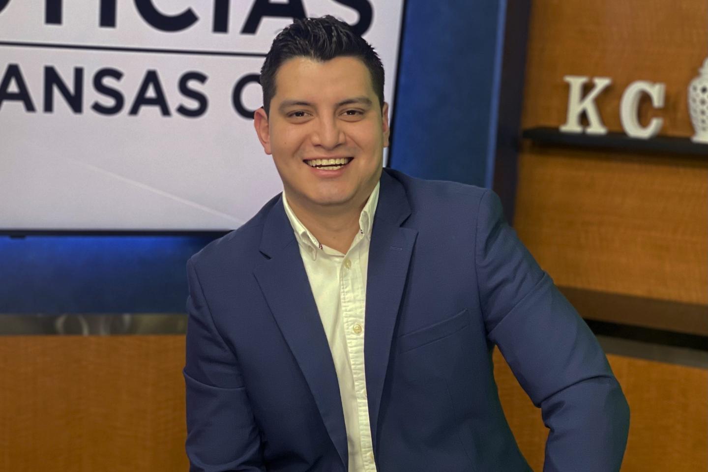 TV reporter Adan Manzano smiles for the camera