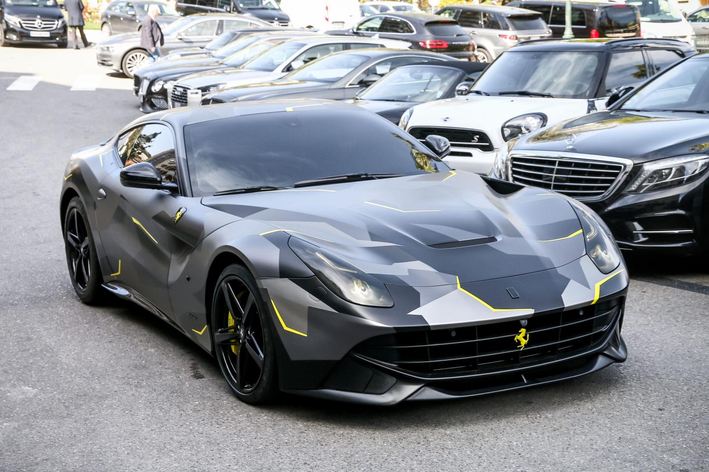Luxury sports car Supercar Ferrari F12 Berlinetta in the city street near the casino.