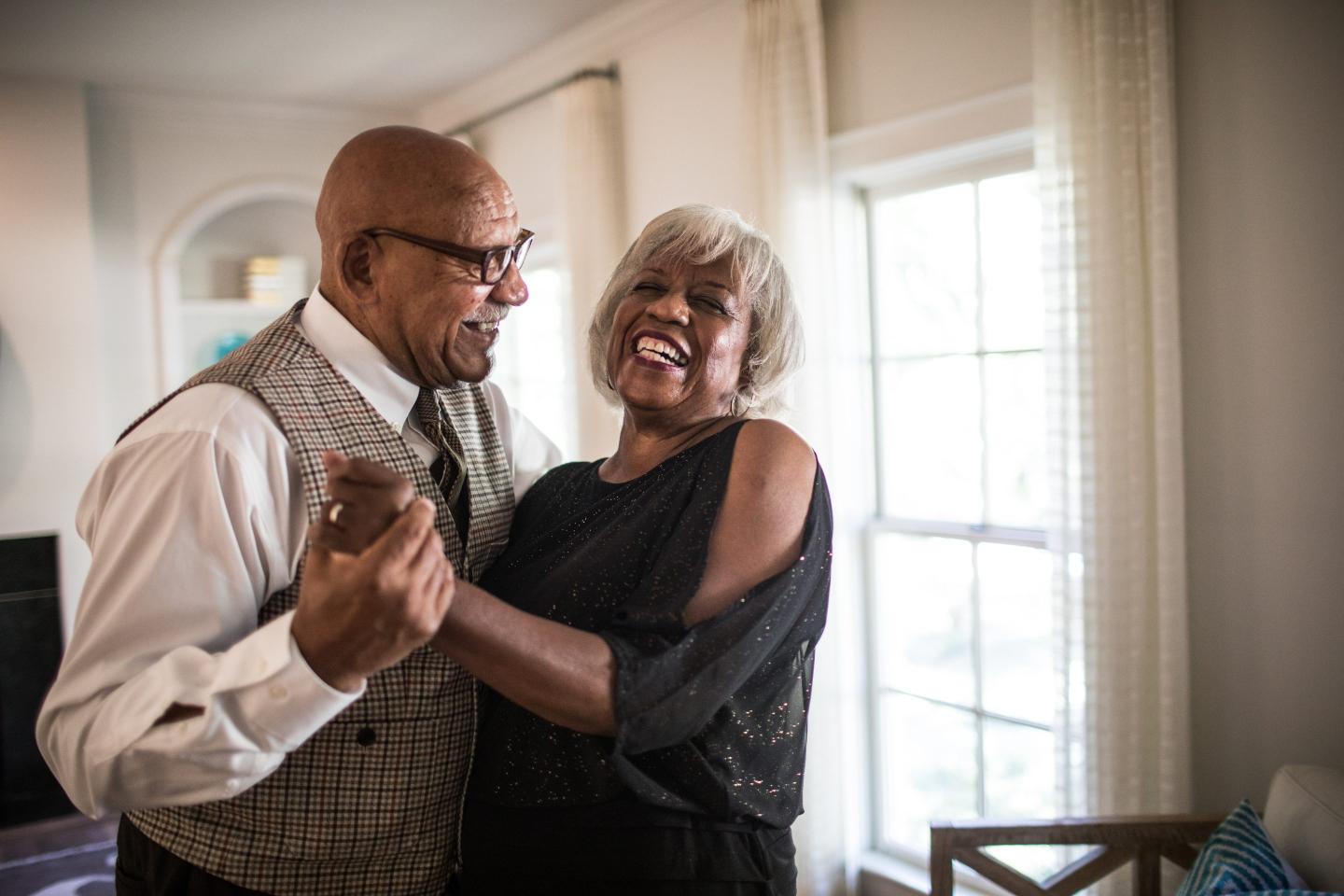 A happy couple dancing
