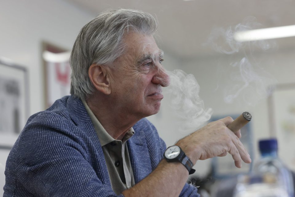 Nick Hayek, CEO of Swatch Group, pictured with a cigar in hand