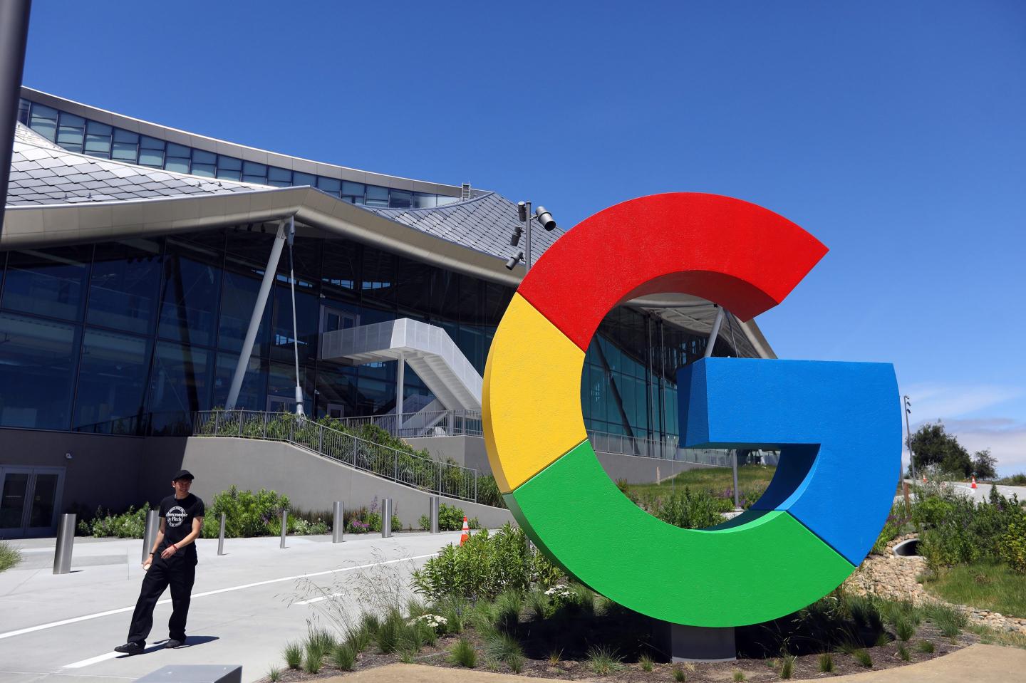A large G logo outside of the Google office in California