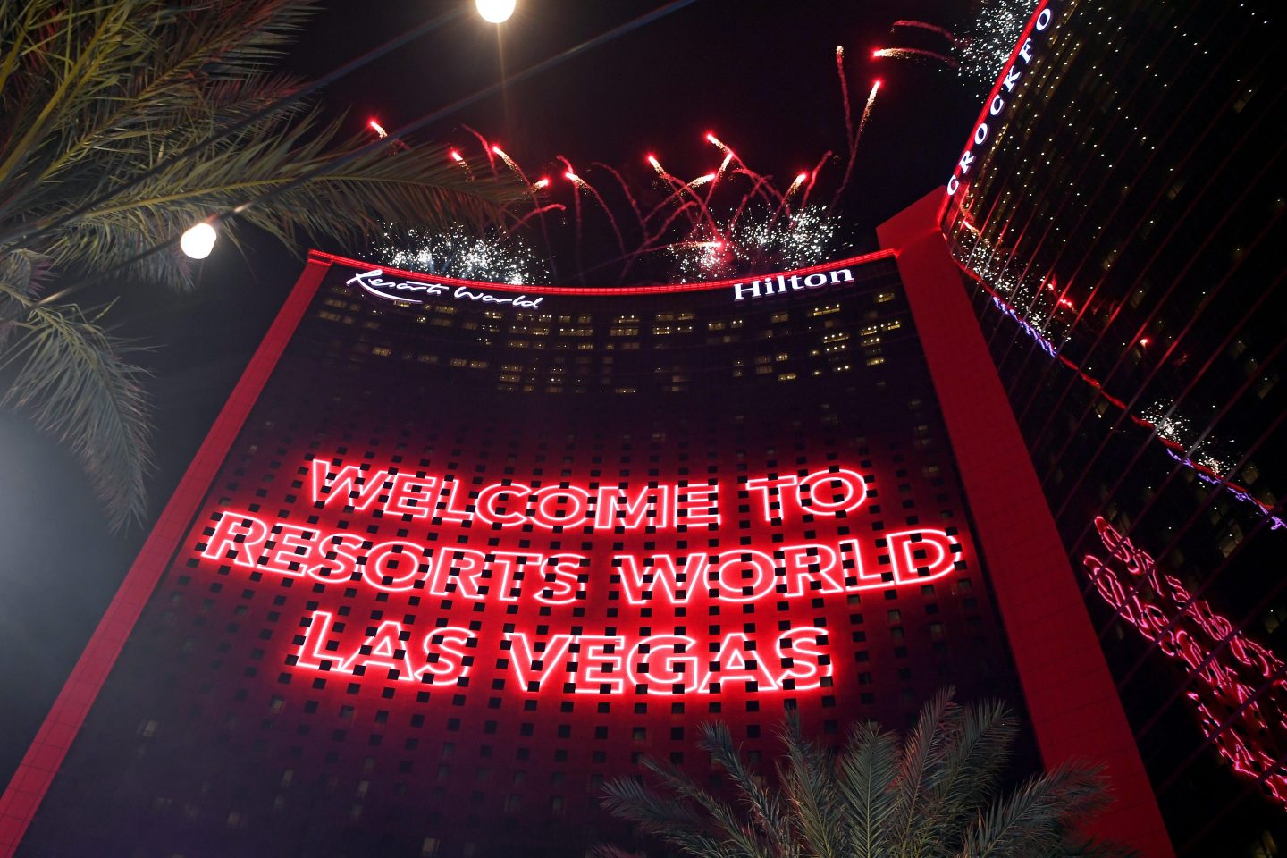 'Welcome to Resorts World Las Vegas' is displayed on a hotel tower's facade while fireworks are deployed during Resorts World Las Vegas Grand opening on June 24, 2021 in Las Vegas, Nevada.