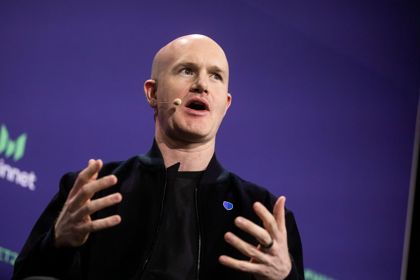Brian Armstrong speaks at a 2023 conference.