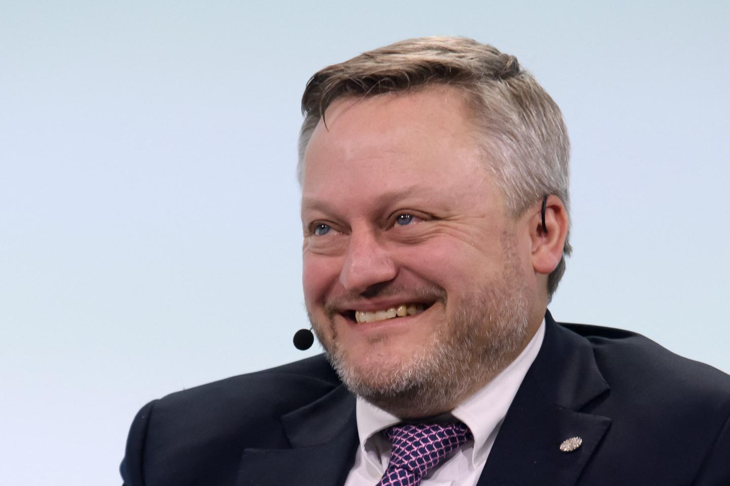 Embattled BP beats on earnings as it touts selling oil, not cups of coffee, as Wall Street pokes fun at its former CEO