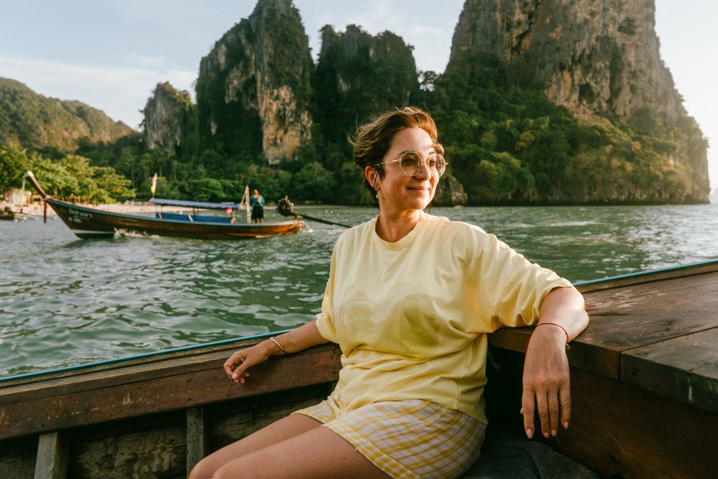 Rich woman lounging on boat