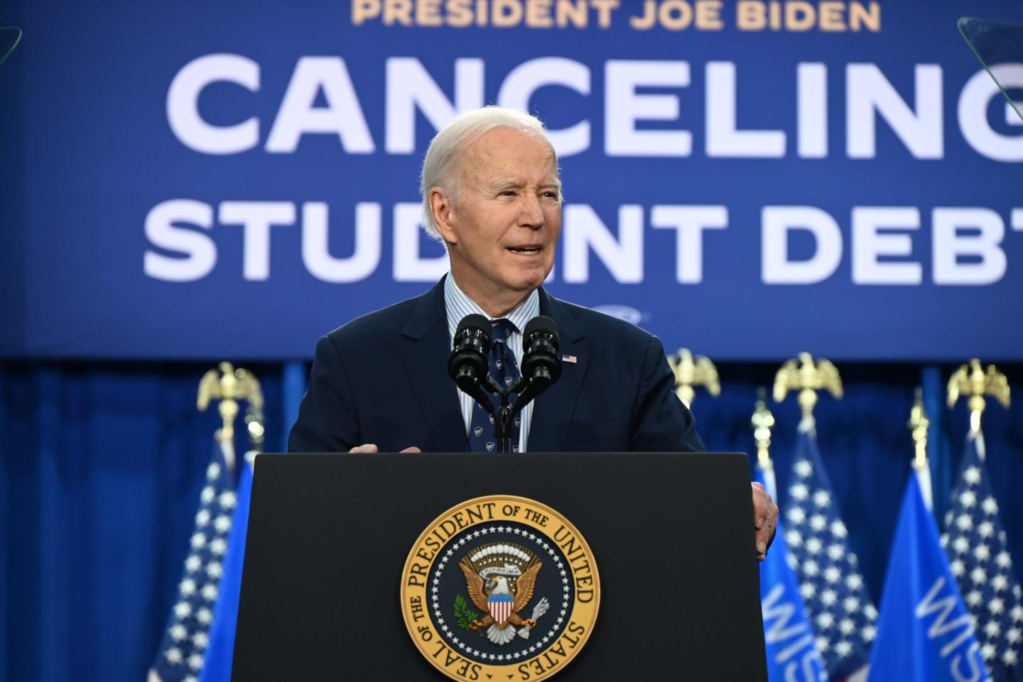 President Joe Biden at a podium.