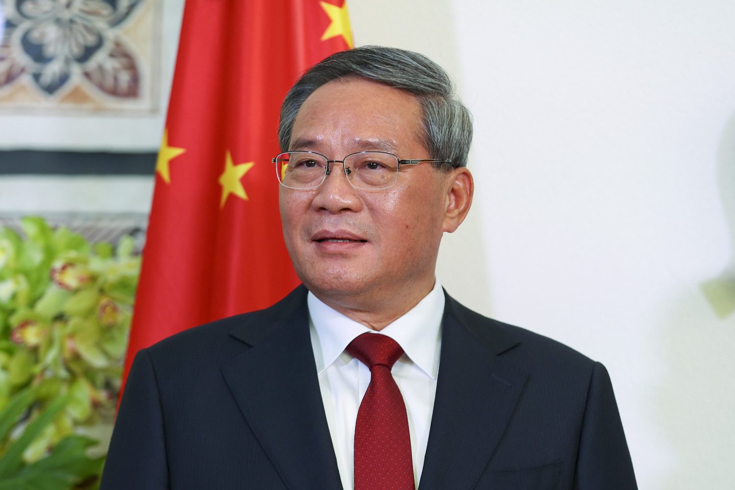 Chinese Premier Li Qiang looks on during a signing ceremony with New Zealand Prime Minister Christopher Luxon.