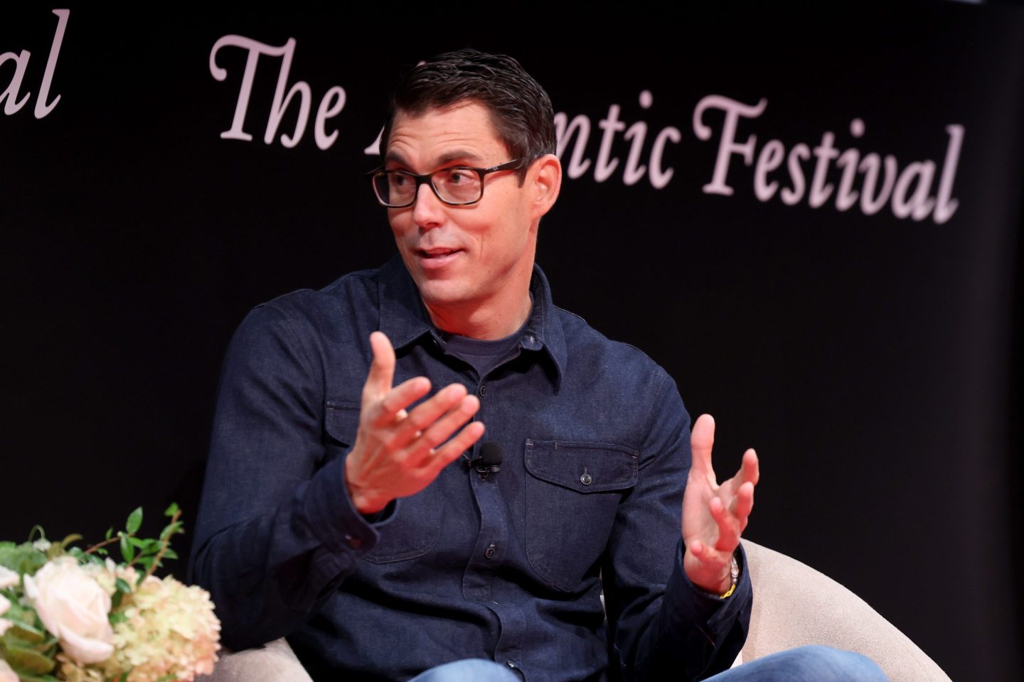 RJ Scaringe speaks on stage during the "Empowering Communities to Embrace Clean Energy" panel for The Atlantic Festival 2024 on September 20, 2024 in Washington, DC