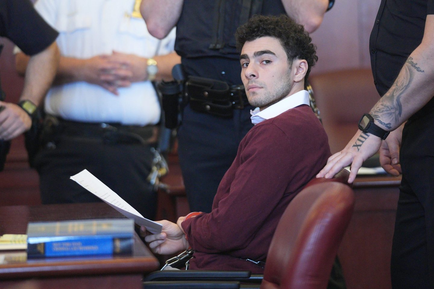 Luigi Mangione appears for his arraignment at Manhattan Criminal Court on December 23, 2024 in New York City. Mangione, 26, was arraigned on state murder charges in the killing of UnitedHealthcare CEO Brian Thompson on a Manhattan street on December 4.