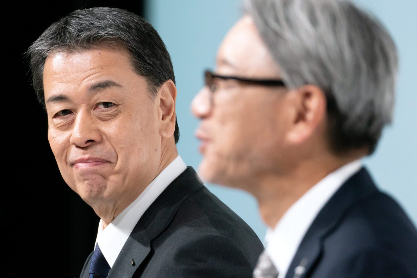 Nissan Motor CEO Makoto Uchida (L) looks on as Honda Motor CEO Toshihiro Mibe (R) speaks during a joint press conference on December 23, 2024, in Tokyo, Japan.