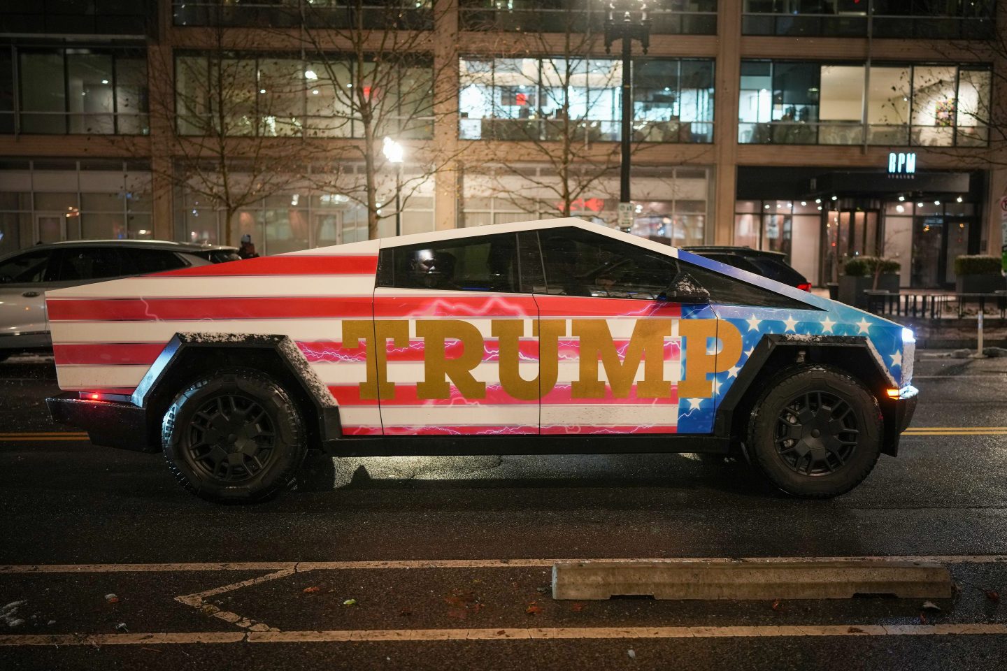 A Donald Trump–adorned Tesla Cybertruck sits in traffic on Jan. 19, 2025, in Washington, D.C.