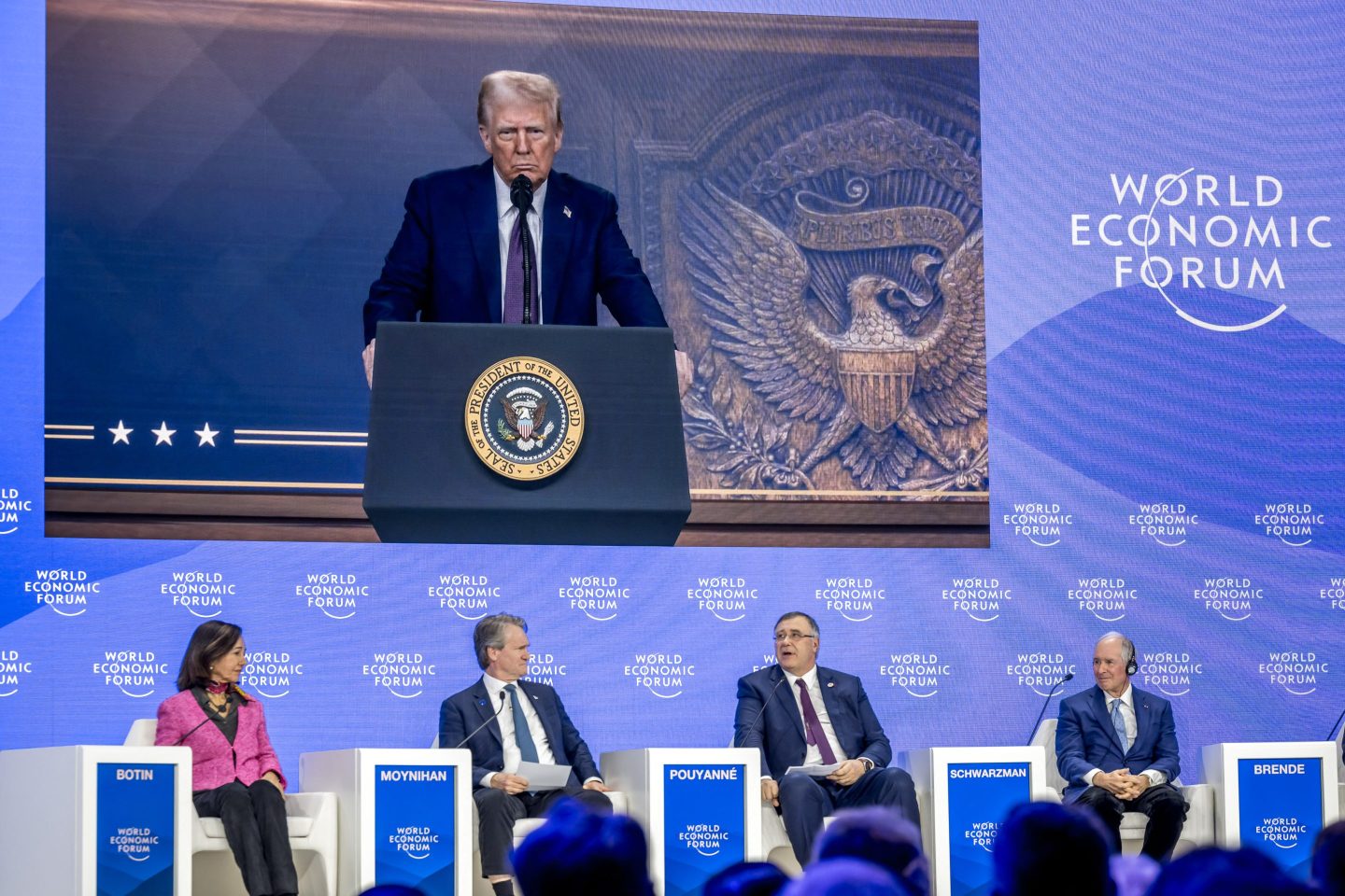 From left to right: Banco Santander executive chairperson Ana Botin, Bank of America chair and CEO Brian Moynihan, TotalEnergies chairman and CEO Patrick Pouyanne and Blackstone Group chair and CEO Stephen Schwarzman, during Trump's address at Davos.