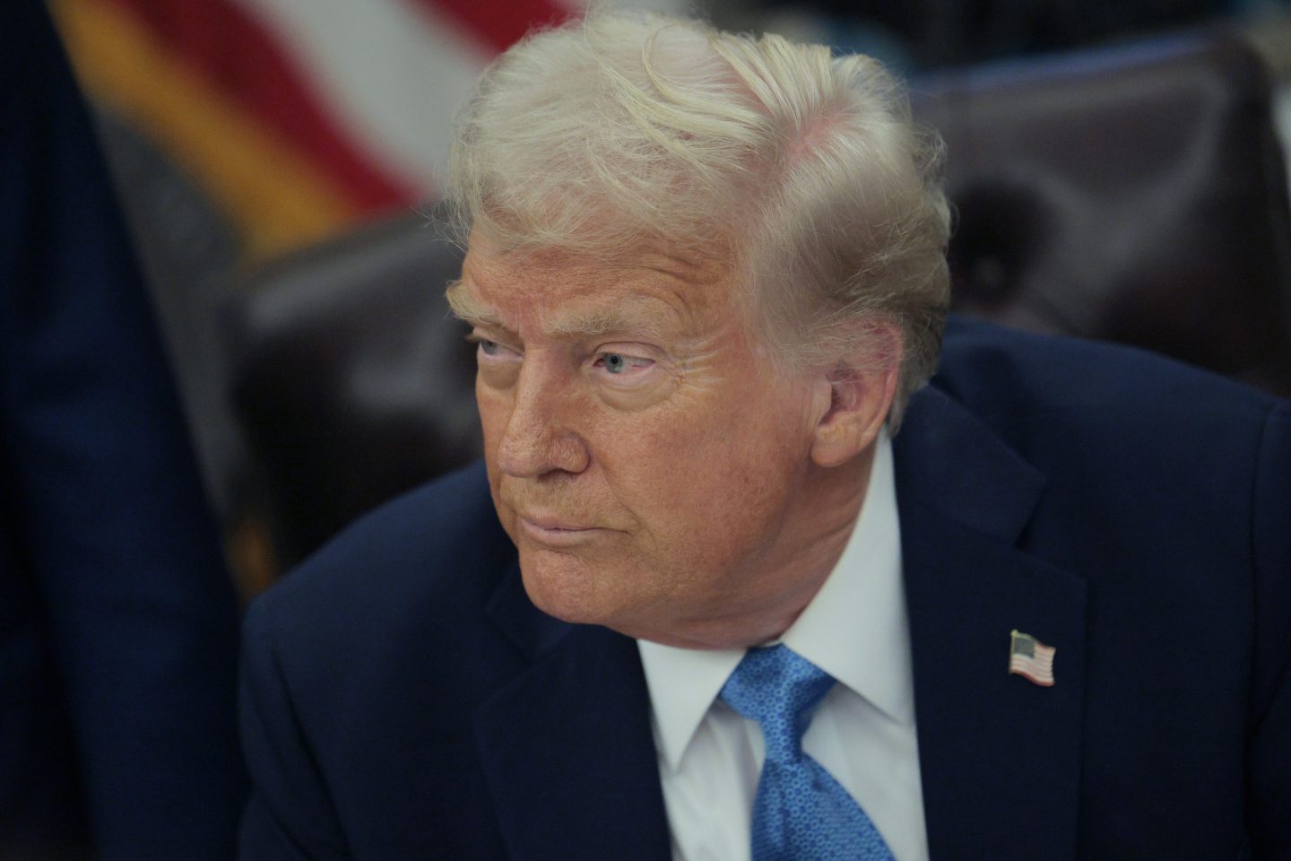 U.S. President Donald Trump talks to reporters after signing an executive order, "Unleashing prosperity through deregulation," in the Oval Office on January 31, 2025 in Washington, DC.