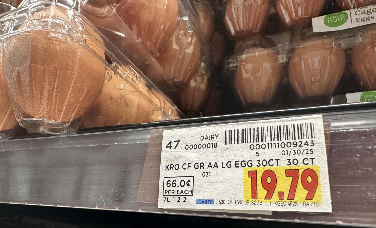 A price tag for a carton of eggs reads $19.79.